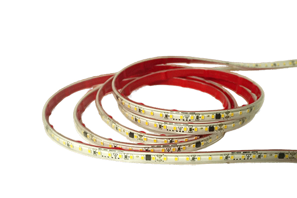 How does wireless bridge technology enable long-distance, single-ended powering of high-voltage light strips without the need for intermediate wiring?